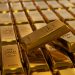 JPMorgan tweaks gold price target as Fed risks return